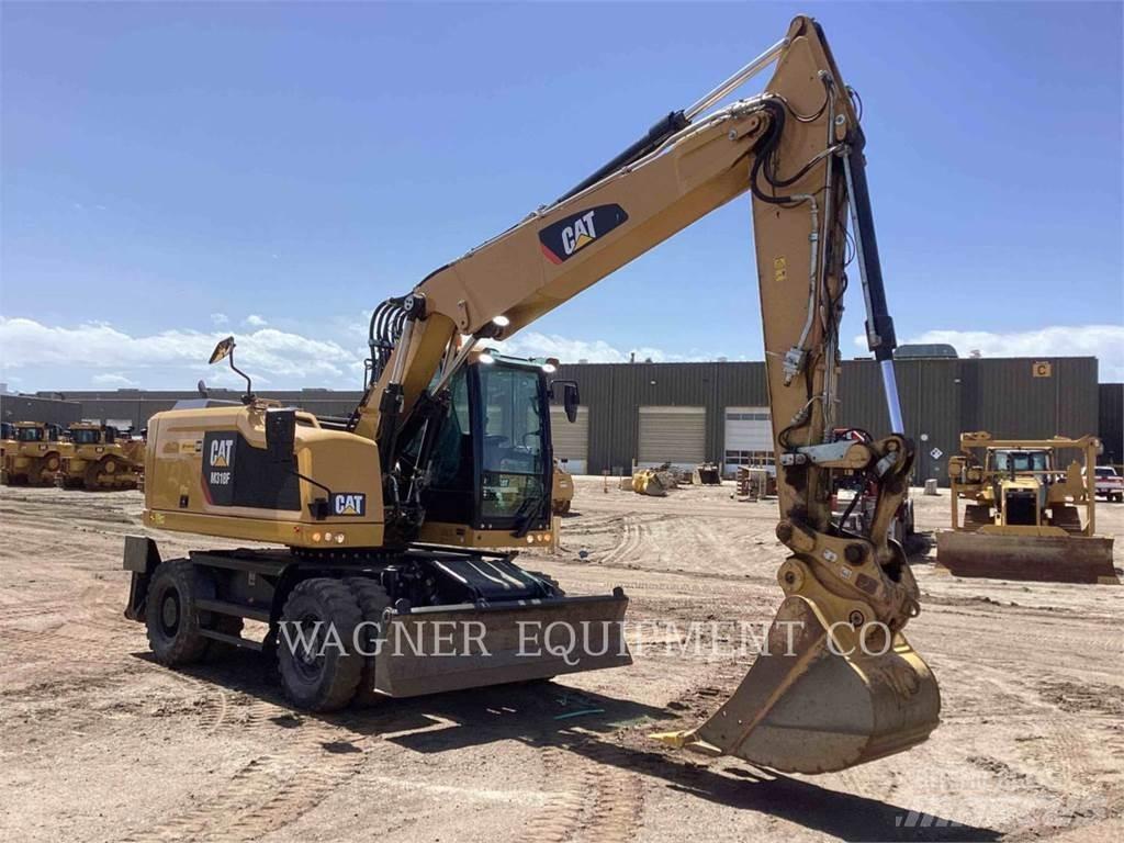 CAT M318F Bagri na kolesih