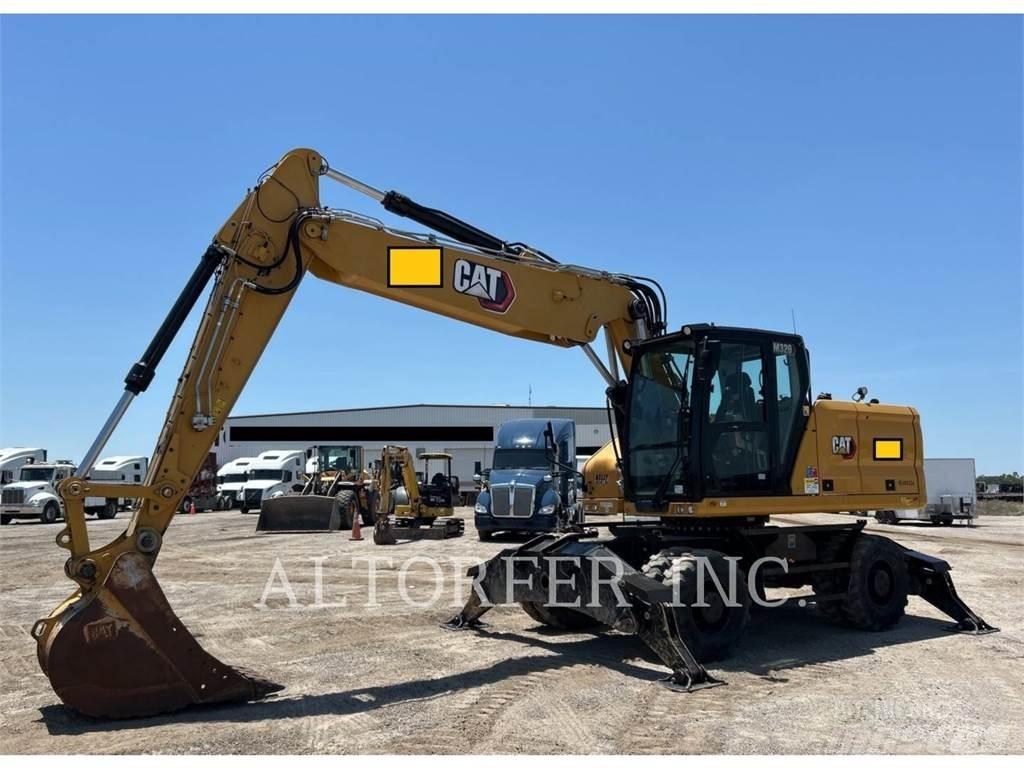 CAT M320 Bagri na kolesih