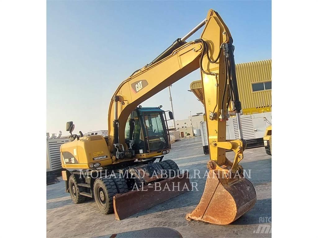 CAT M320D2 Bagri na kolesih