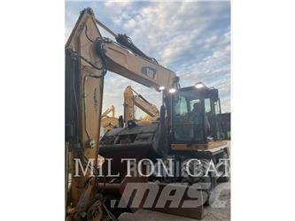 CAT M320F Bagri na kolesih