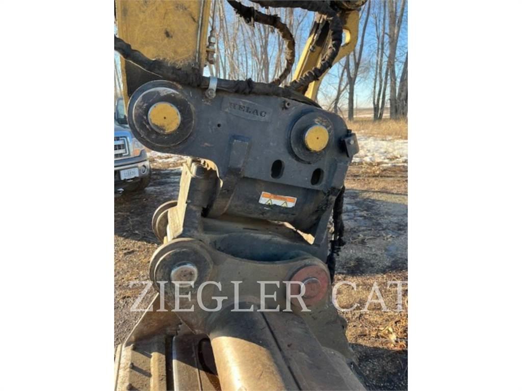 CAT M320F Bagri na kolesih
