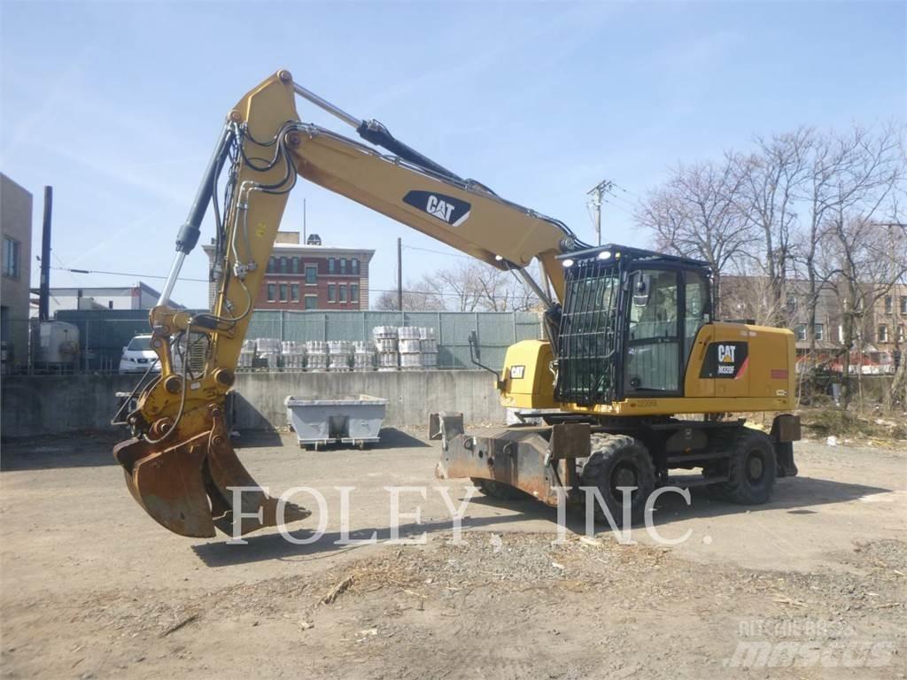 CAT M320F Bagri na kolesih