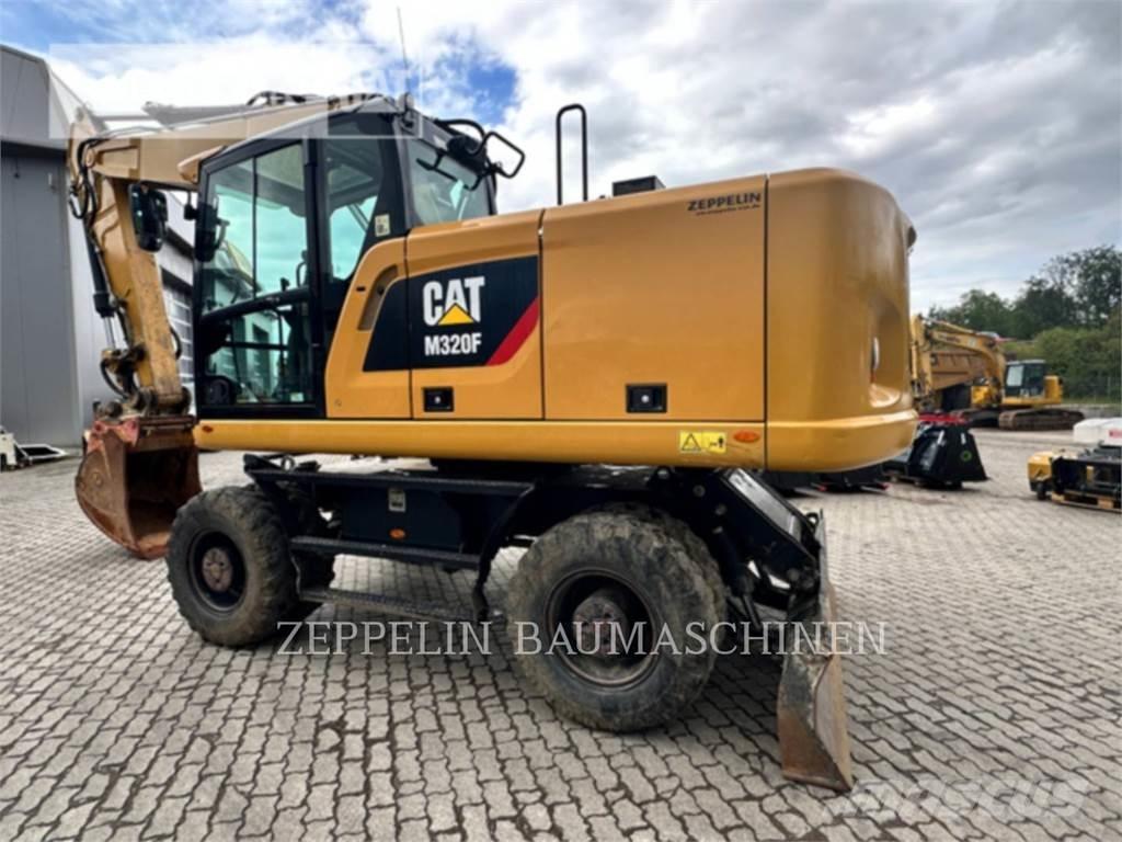 CAT M320F Bagri na kolesih