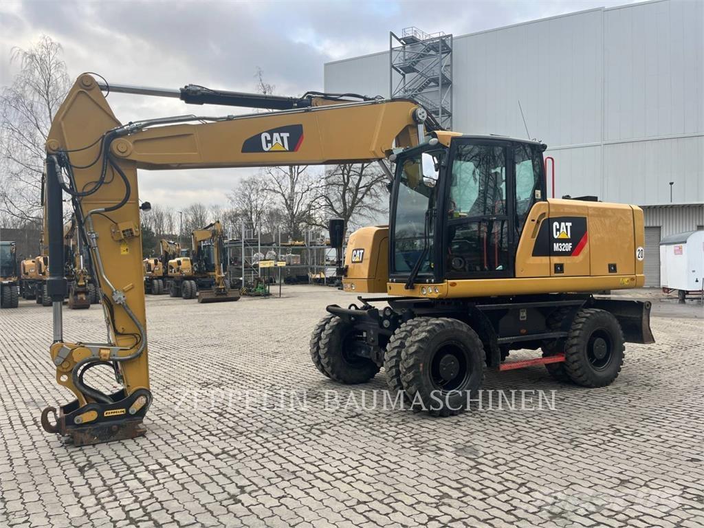 CAT M320F Bagri na kolesih