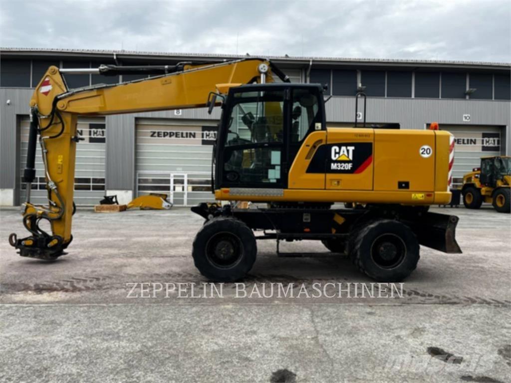 CAT M320F Bagri na kolesih