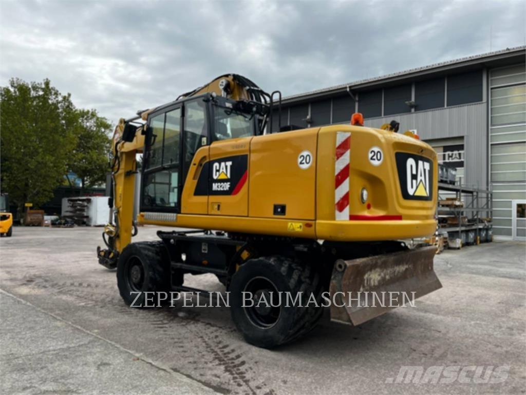CAT M320F Bagri na kolesih