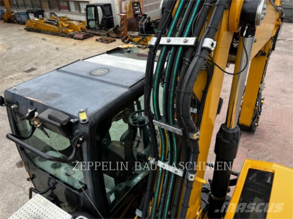 CAT M320F Bagri na kolesih