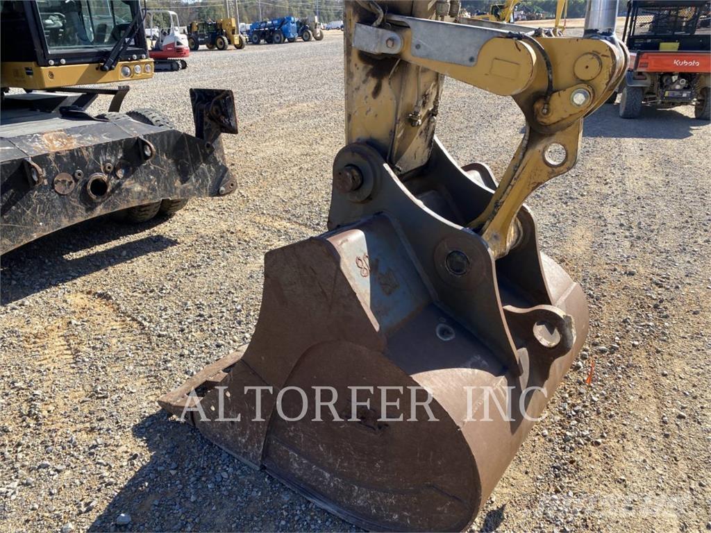 CAT M320F Bagri na kolesih