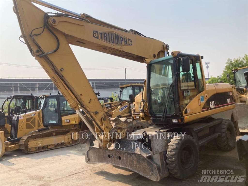 CAT M322C Bagri na kolesih