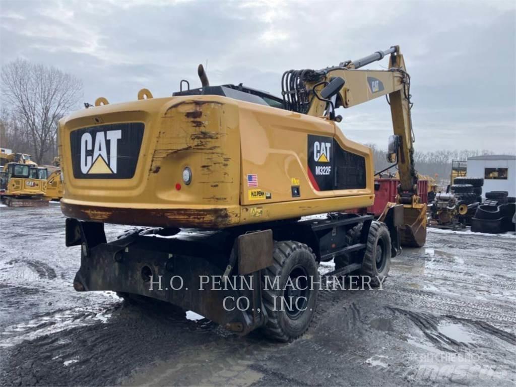 CAT M322F Bagri na kolesih