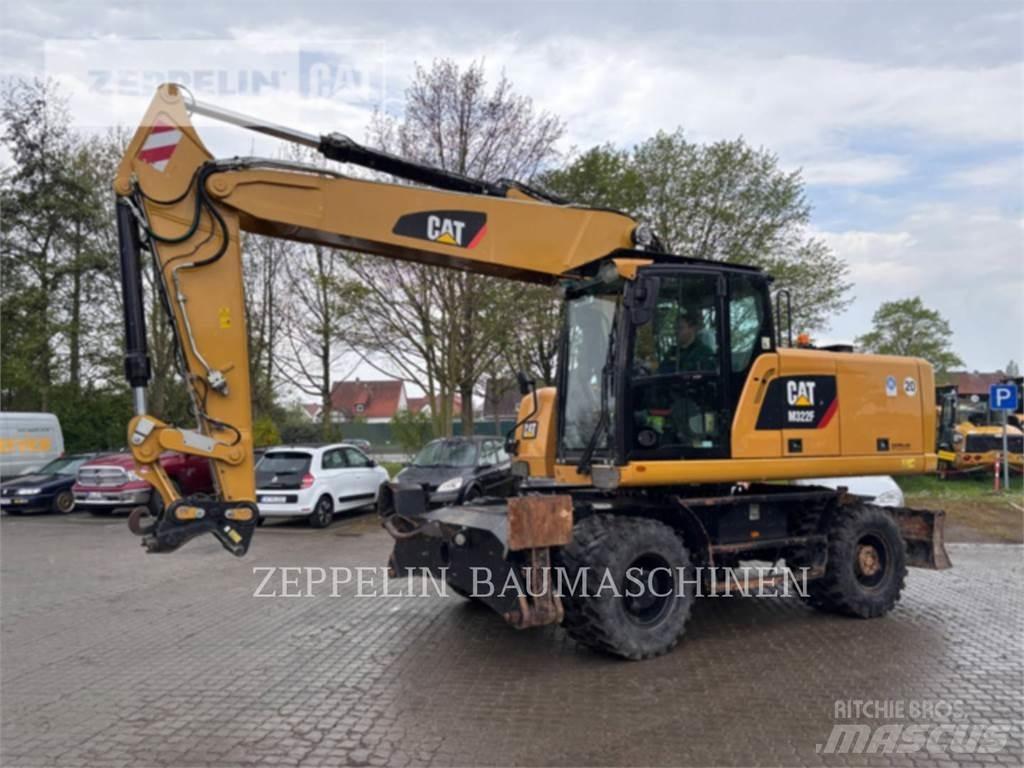 CAT M322F Bagri na kolesih