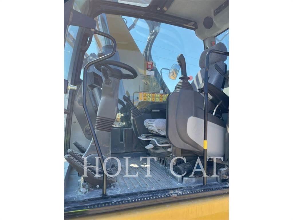 CAT M322F Bagri na kolesih