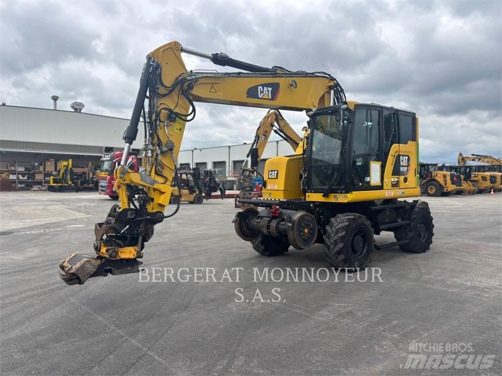 CAT M323F Bagri na kolesih