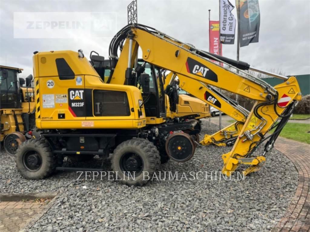 CAT M323F Bagri na kolesih