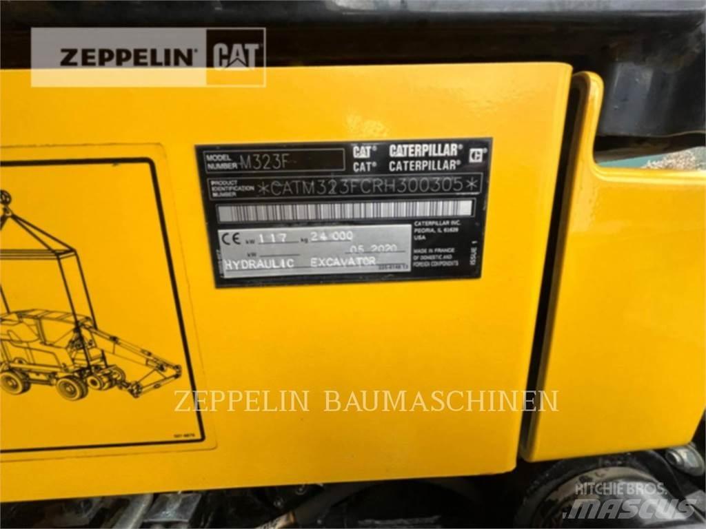 CAT M323F Bagri na kolesih