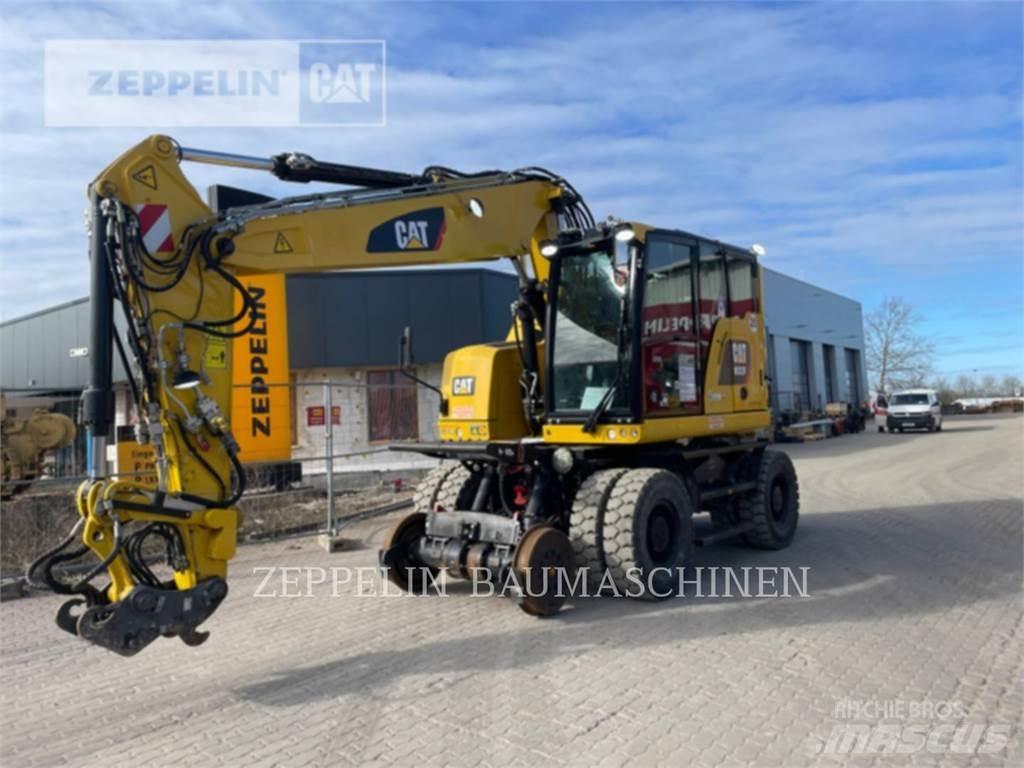 CAT M323F Bagri na kolesih