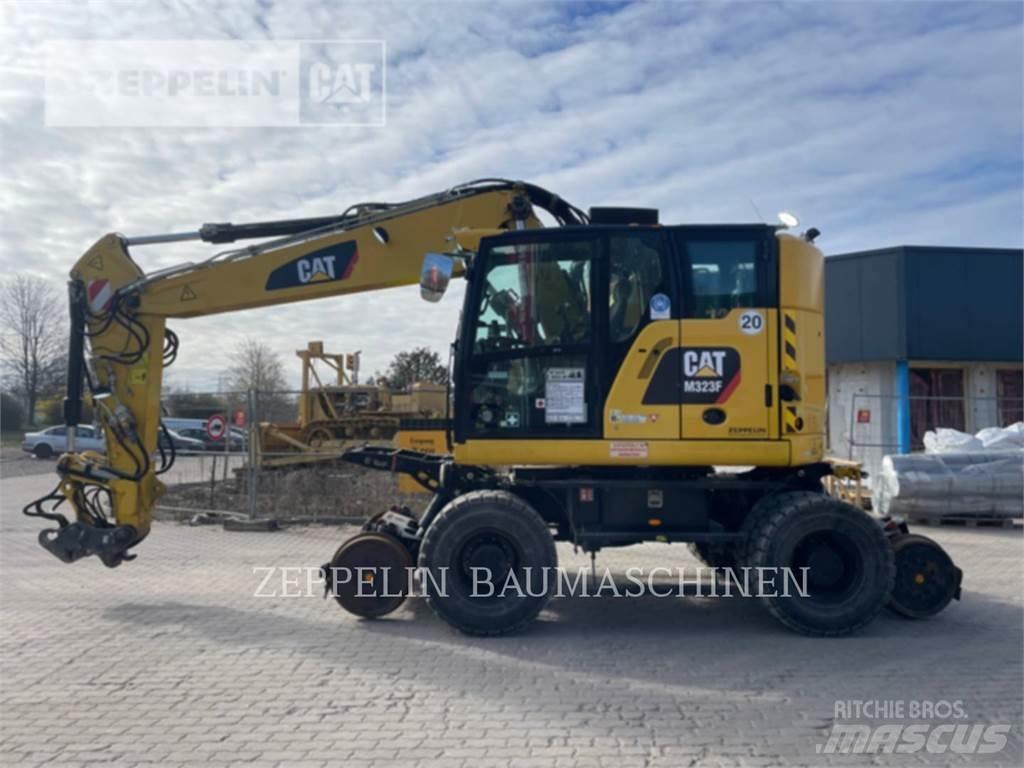 CAT M323F Bagri na kolesih