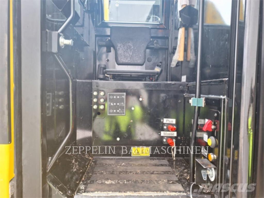 CAT M323F Bagri na kolesih