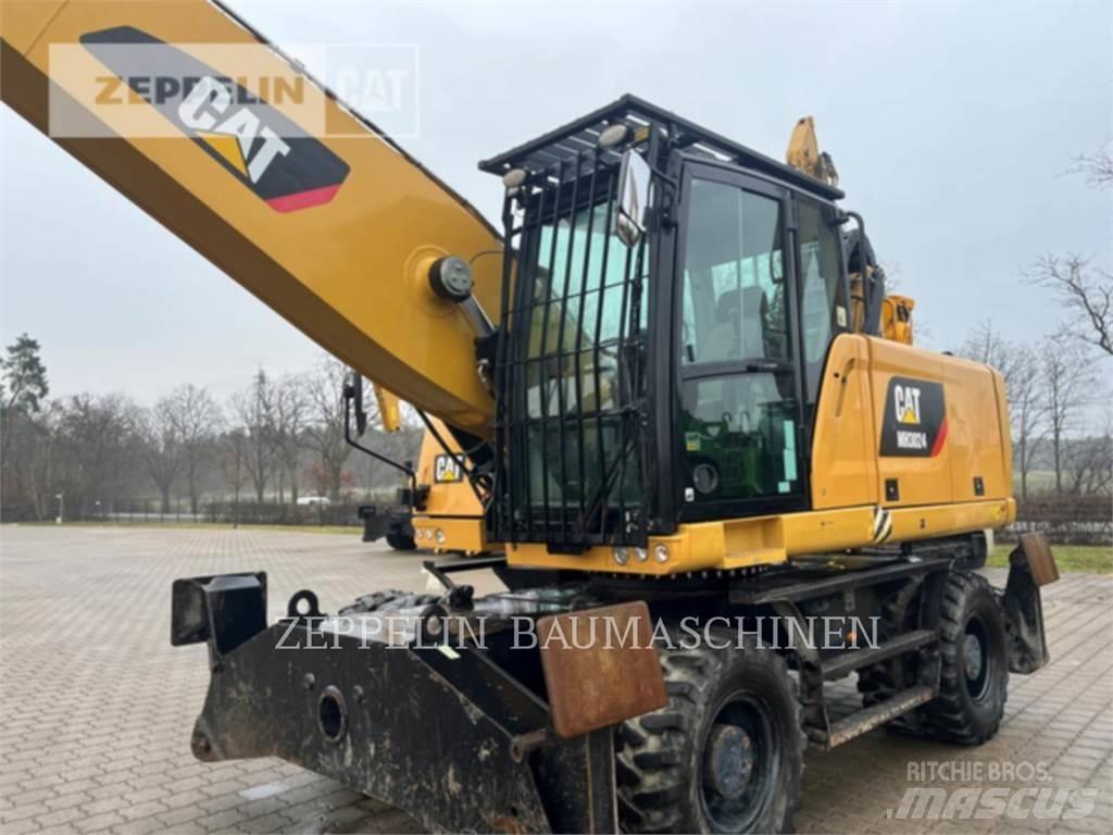 CAT MH3024 Rušilni bagri
