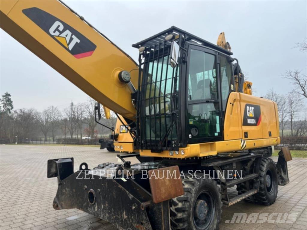CAT MH3024 Rušilni bagri