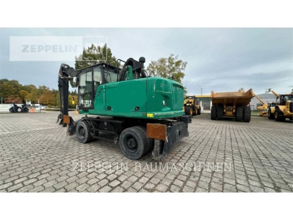 CAT MH3024-06C Rušilni bagri