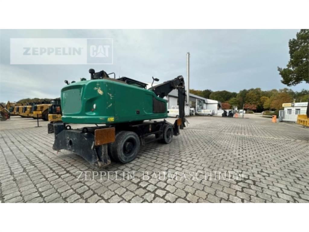 CAT MH3024-06C Rušilni bagri