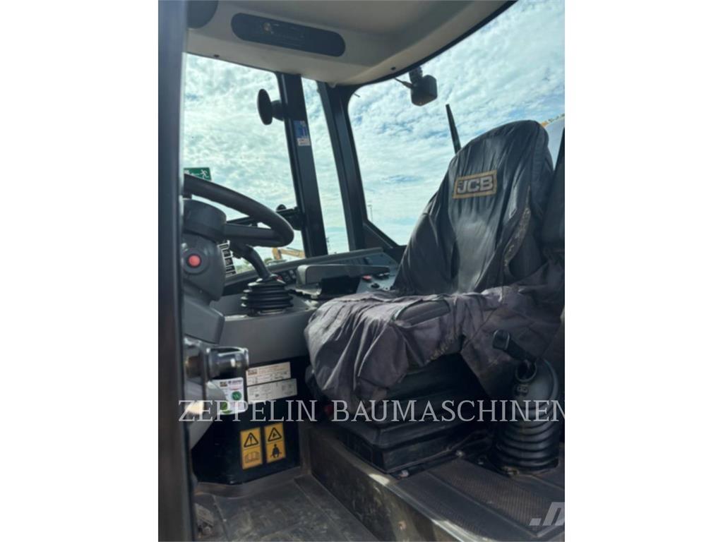 JCB 409 Kolesni nakladalci