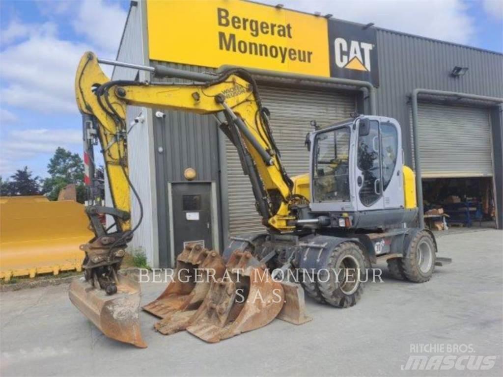 Neuson EW100 Bagri na kolesih
