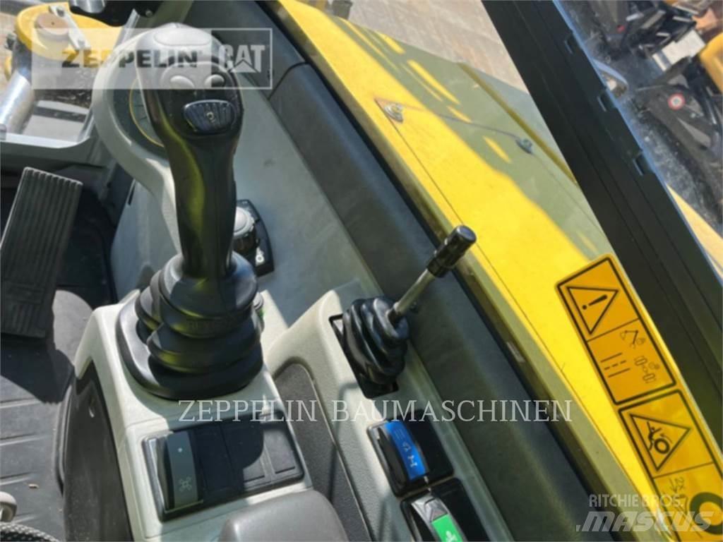 Neuson EW100 Bagri na kolesih