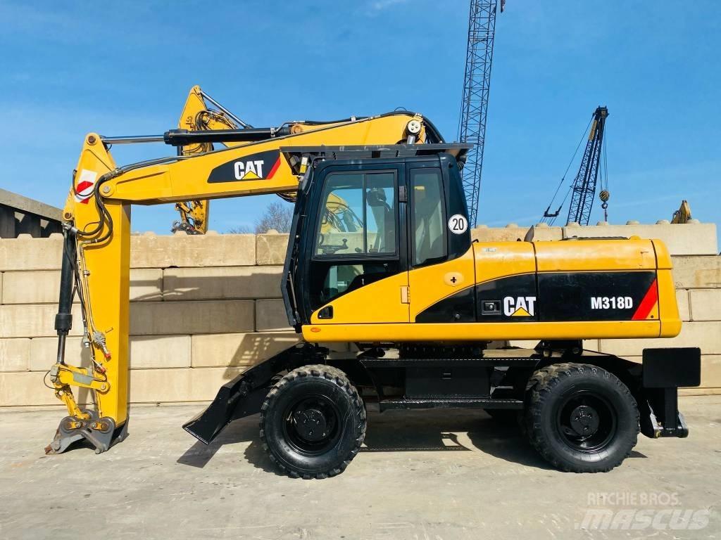 CAT M 318 D Bagri na kolesih