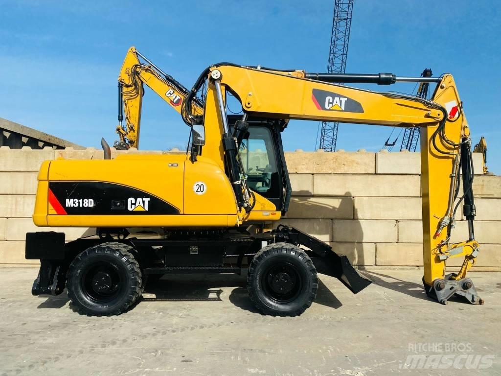 CAT M 318 D Bagri na kolesih