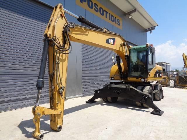 CAT M 318 D Bagri na kolesih