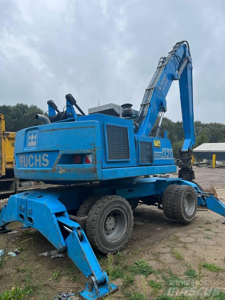 Fuchs MHL 320 Bagri na kolesih