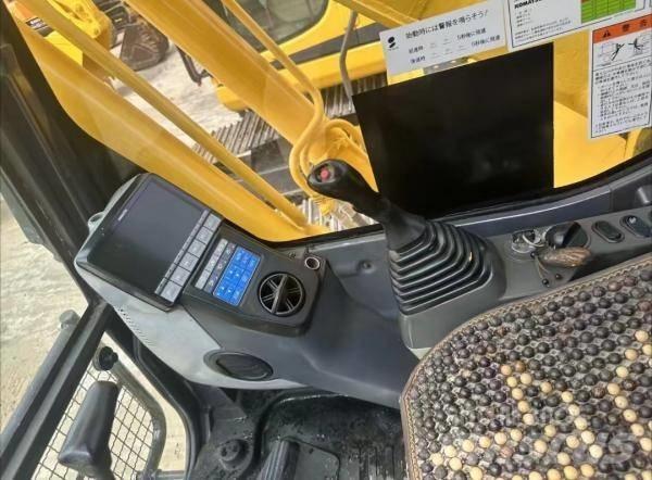 Komatsu PC 200 Midi bagri 7t – 12t