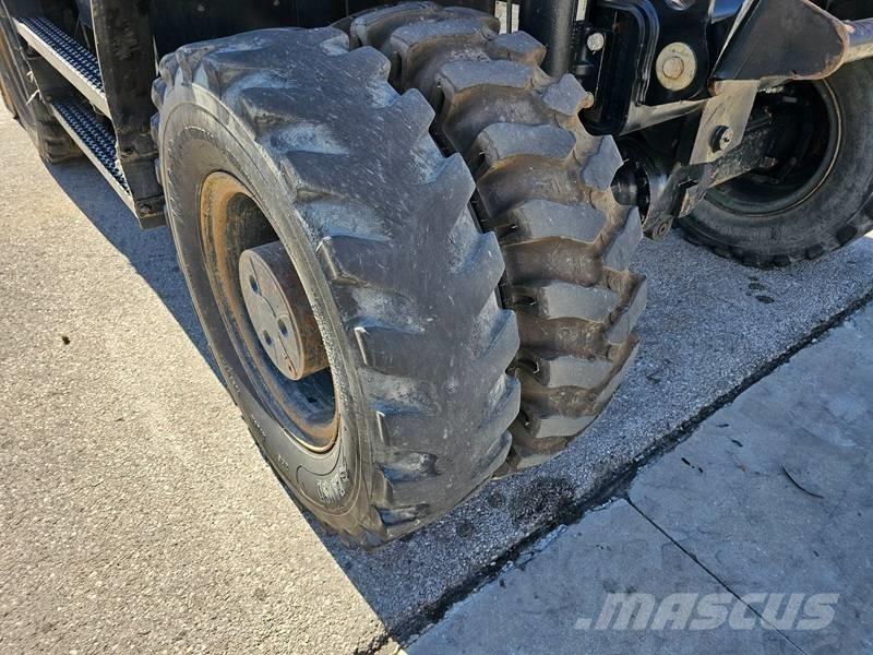 CAT M 320F Bagri na kolesih