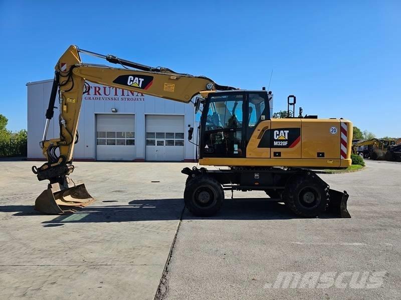 CAT M 320F Bagri na kolesih