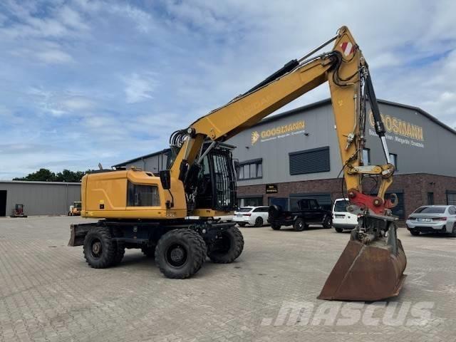 CAT M 318 F Bagri na kolesih
