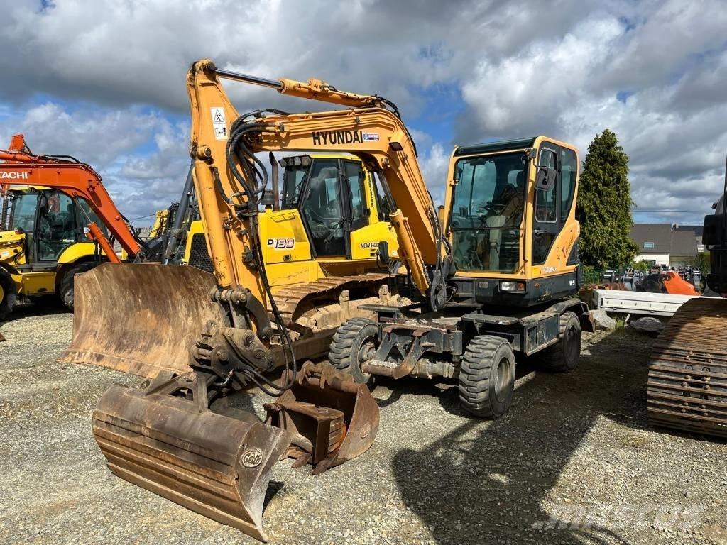 Hyundai R55W-9 Bagri na kolesih