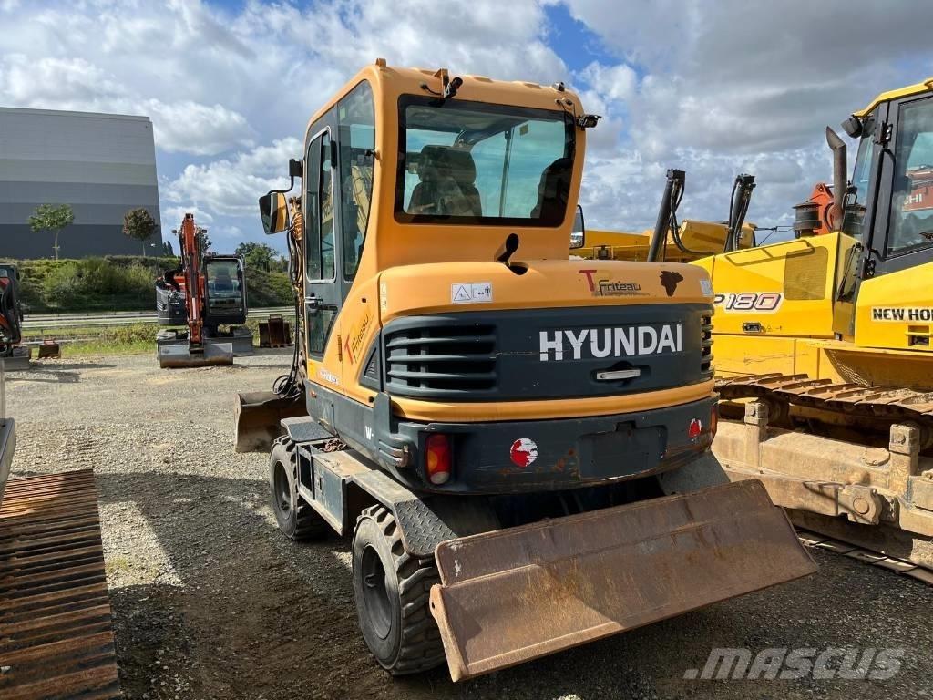 Hyundai R55W-9 Bagri na kolesih
