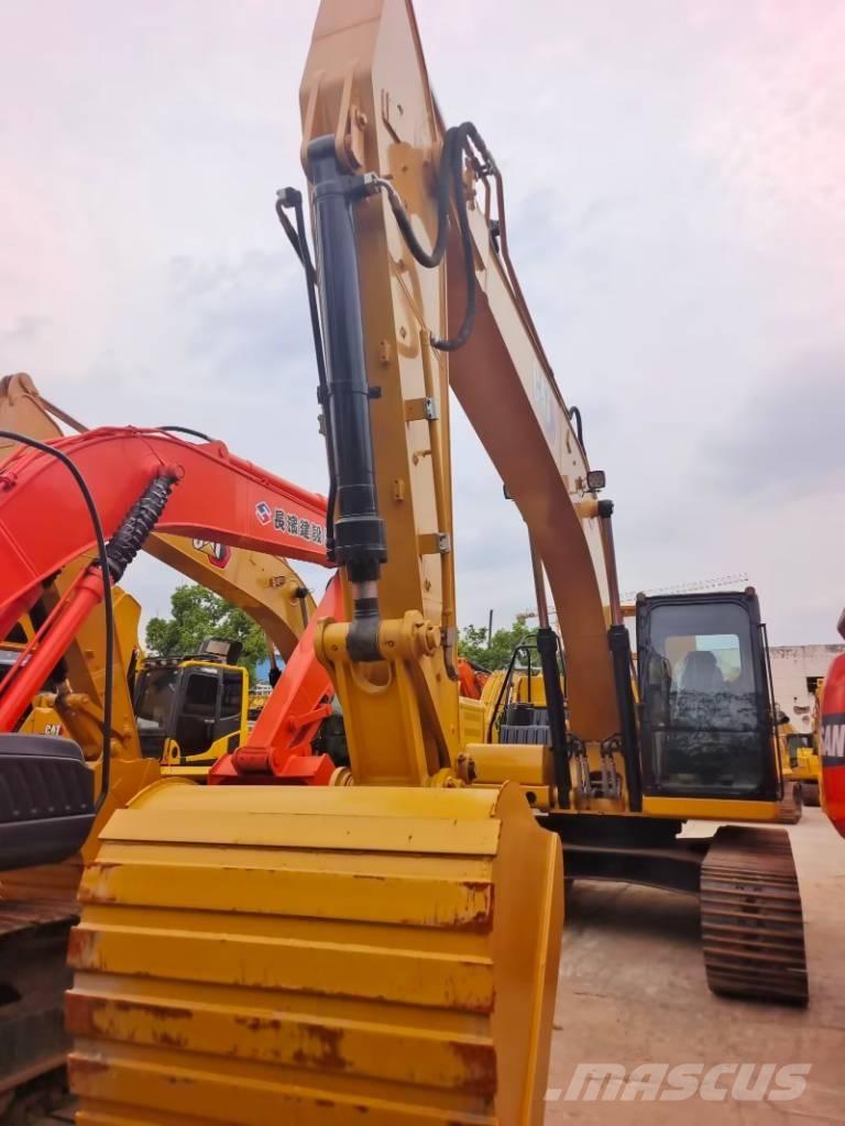 CAT 323 GC Bagri goseničarji