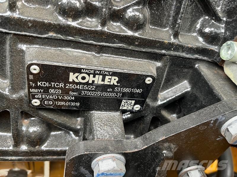 JCB 409 Kolesni nakladalci