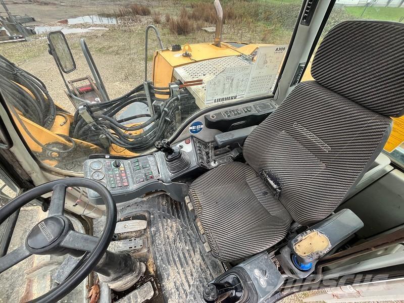 Liebherr A309 Bagri na kolesih