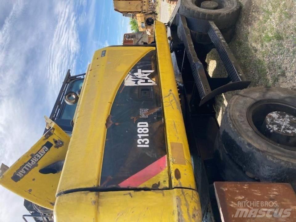 CAT M318D Kabine in notranjost