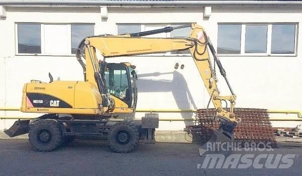 CAT M 315 D Bagri na kolesih