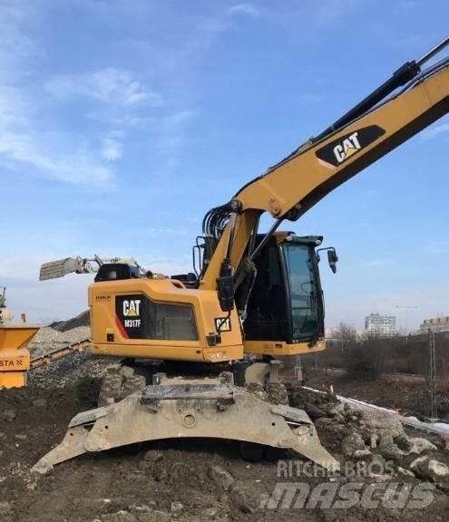 CAT M317 F Bagri na kolesih
