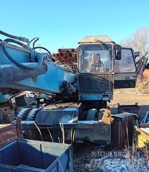 Fuchs 713 Bagri za prekladanje primarnih/sekundarnih surovin
