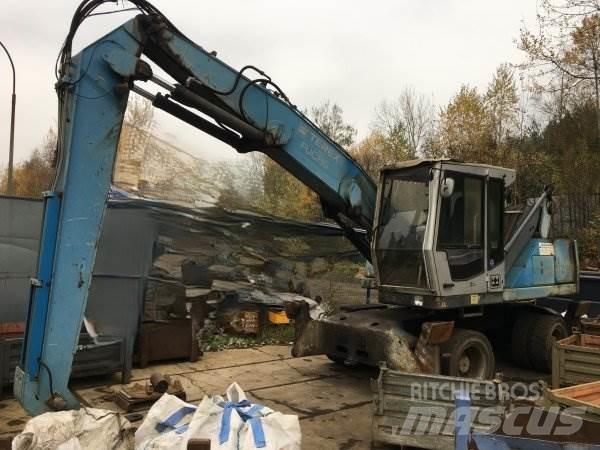 Fuchs MHL 320 Bagri za prekladanje primarnih/sekundarnih surovin
