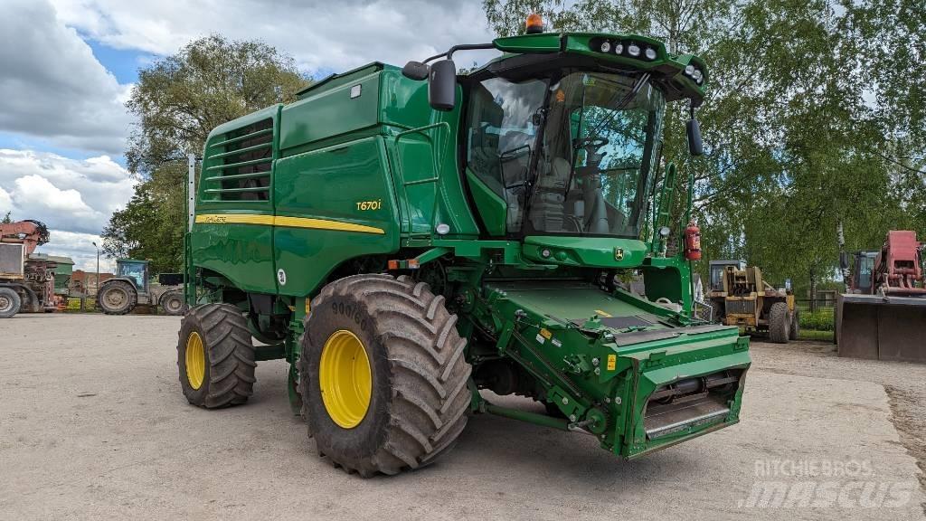 John Deere T 670 i Kombajni