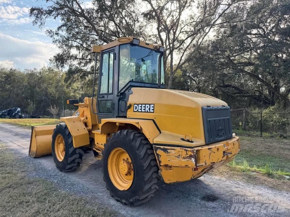 John Deere 324h Kolesni nakladalci