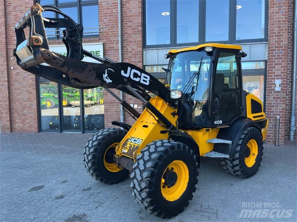 JCB 409 Kolesni nakladalci